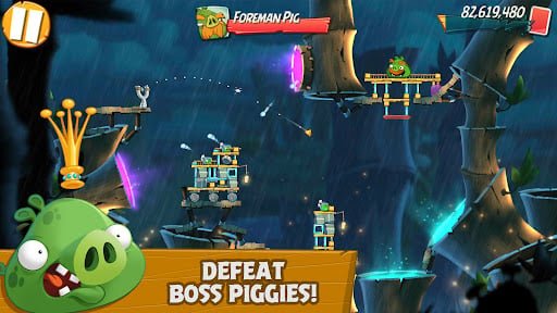 Boss pig battle with a massive armored pig surrounded by protective structures