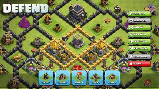 Fully upgraded Town Hall 16 village with golden walls and maxed defenses glowing at night