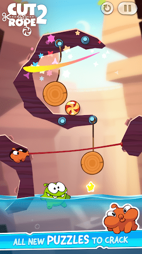 Cut the Rope 3 puzzle level with multiple ropes, bubbles, and star collectibles in a forest setting