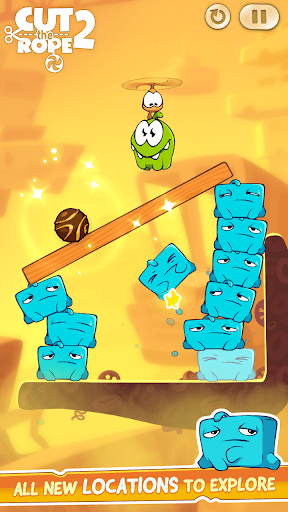 Underground cave level in Cut the Rope 3 with glowing crystals and suspended candy on multiple ropes